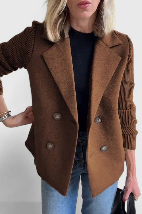 Brown double-breasted blazer with ribbed knit sleeves and notched lapel