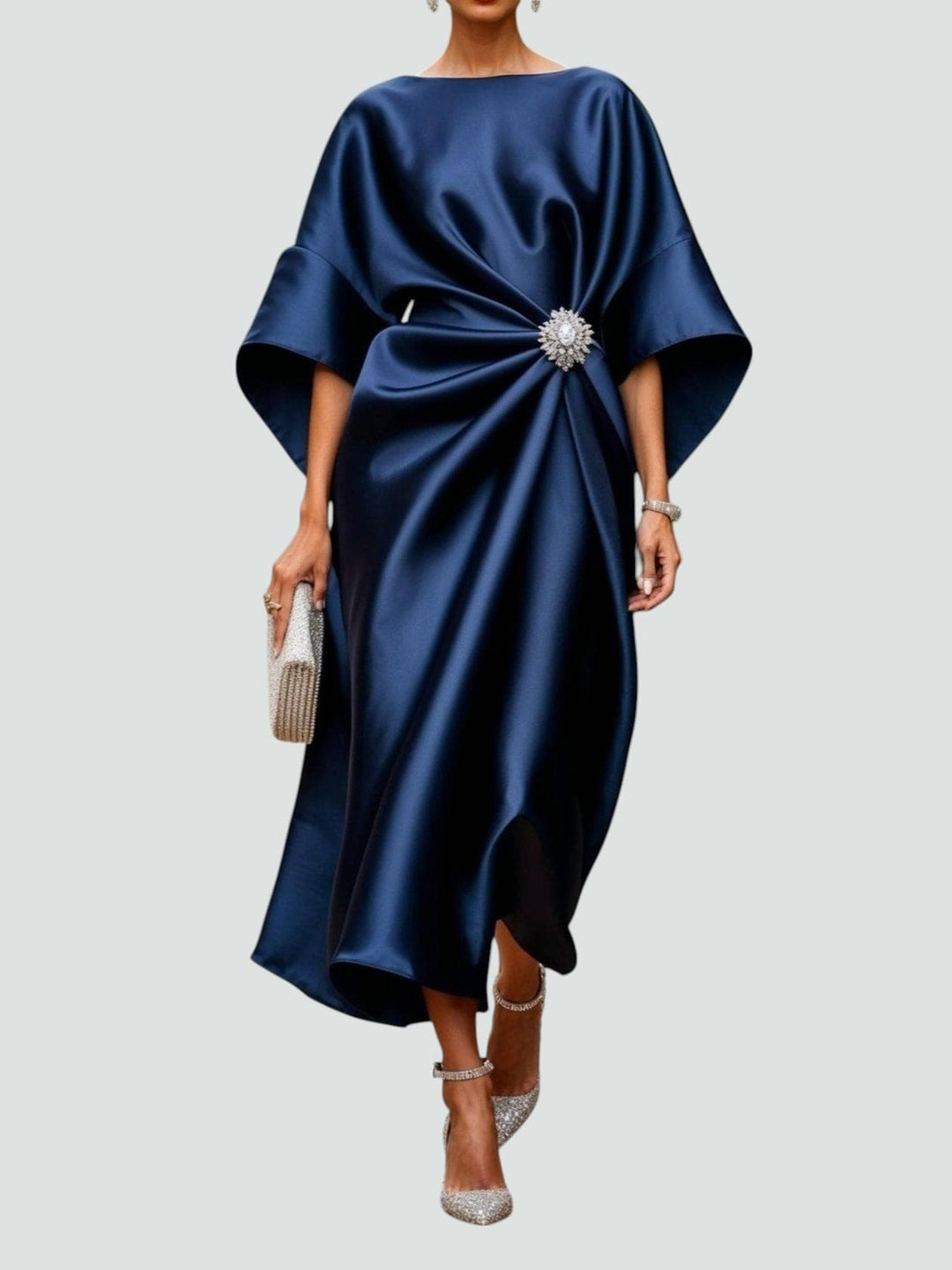 Navy blue satin kaftan dress with draped waist and crystal brooch detail