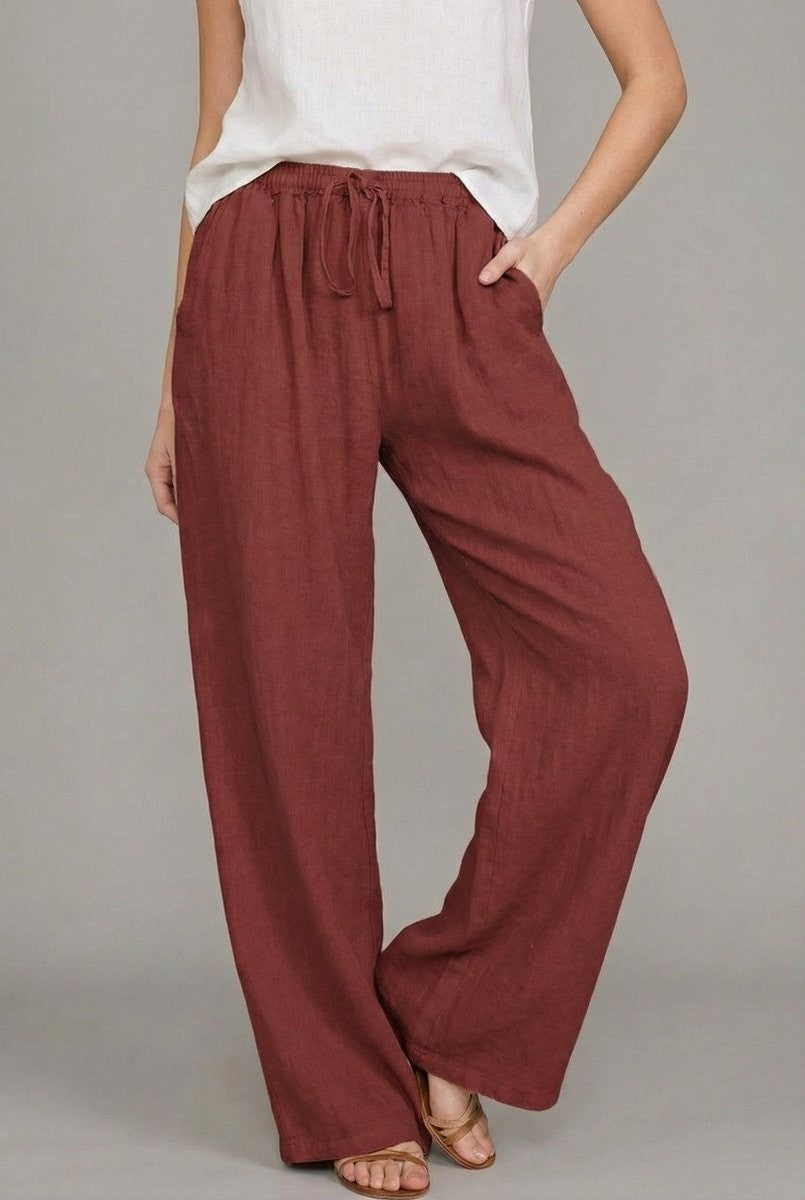 Rust red linen wide leg pants with drawstring waist and side pockets