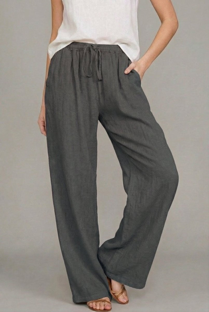 Charcoal gray linen wide leg pants with drawstring waist and slant pockets