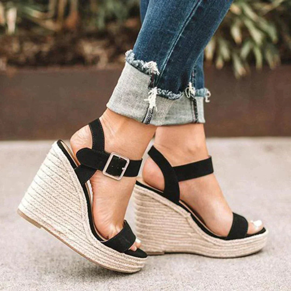 Black suede espadrille wedge sandals with adjustable ankle strap buckle