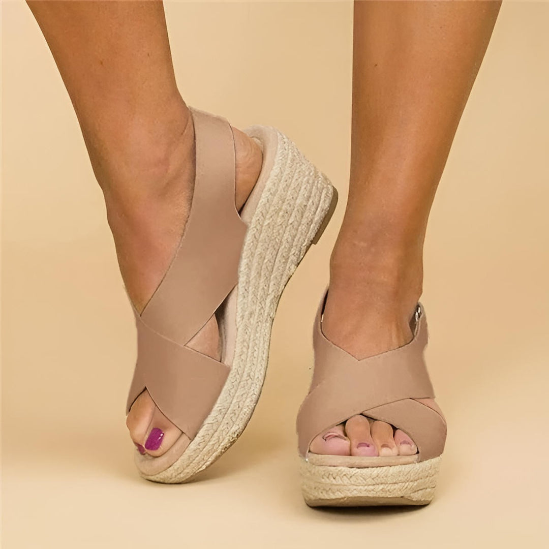 Taupe espadrille wedge sandals with crisscross straps and jute platform sole