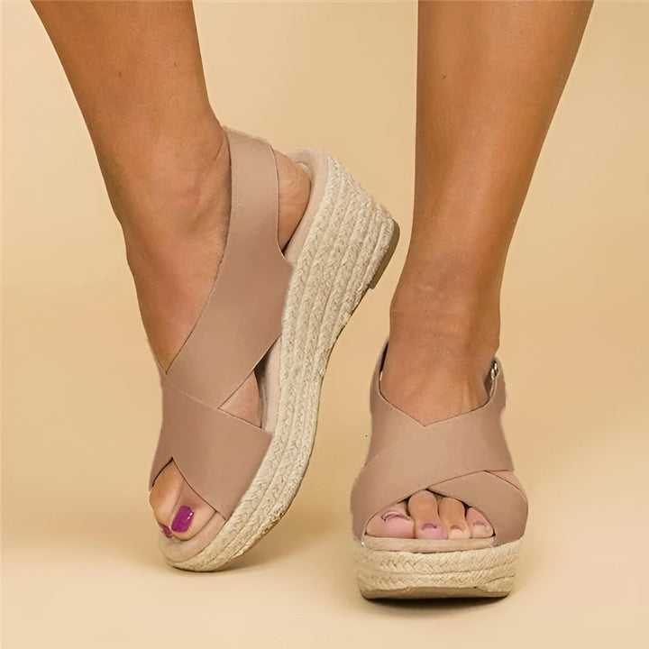 Taupe espadrille wedge sandals with crisscross straps and jute platform sole