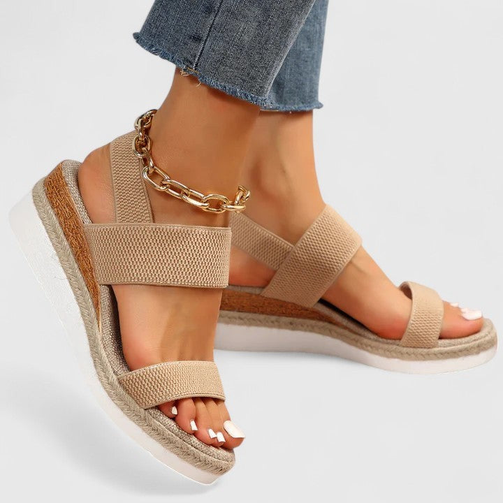beige espadrille wedge sandals with crisscross elastic straps