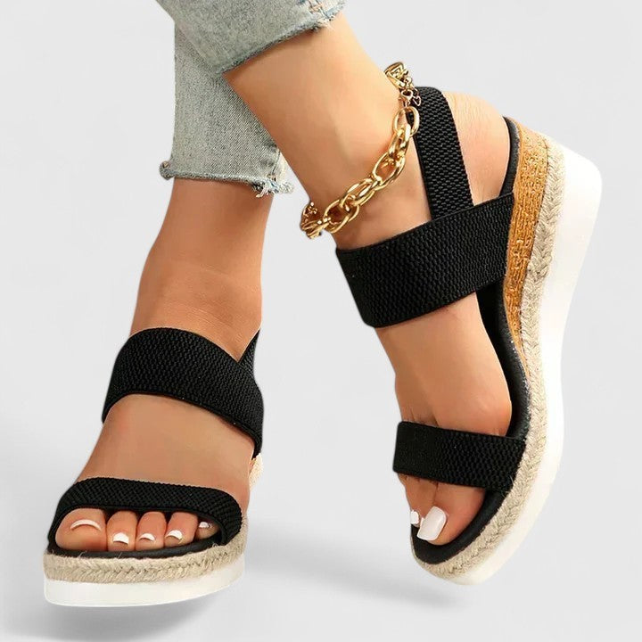 black elastic strap wedge sandals with woven espadrille platform