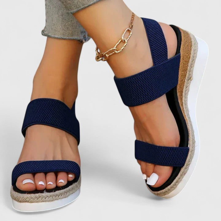 navy blue espadrille wedge sandals with elastic crossover straps
