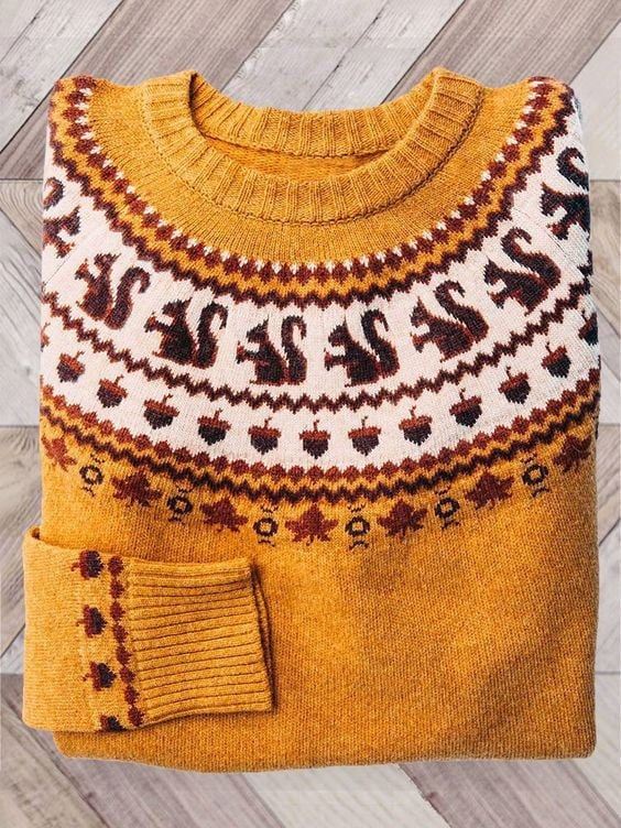 Mustard yellow crew neck sweater featuring squirrel and acorn Fair Isle design