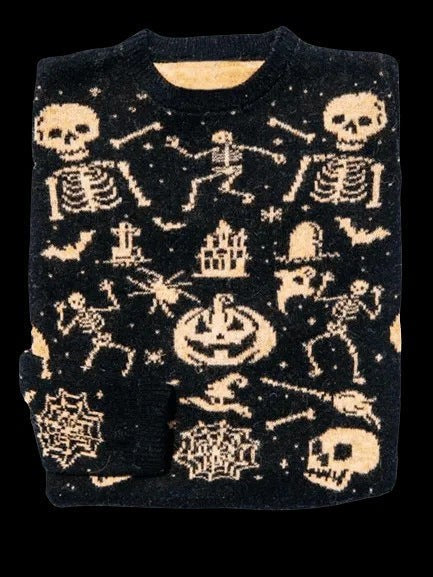 Black knit sweater featuring glow-in-the-dark skeleton and Halloween graphic pattern