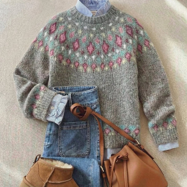 Gray Fair Isle knit sweater with pink and mint yoke pattern, styled with denim
