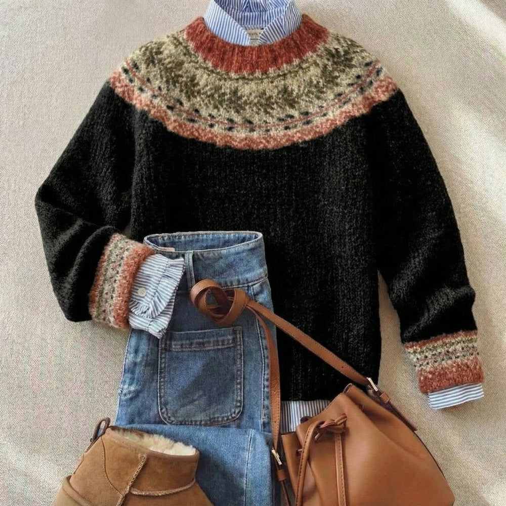 Black Fair Isle sweater featuring rust and olive patterned yoke, paired with jeans
