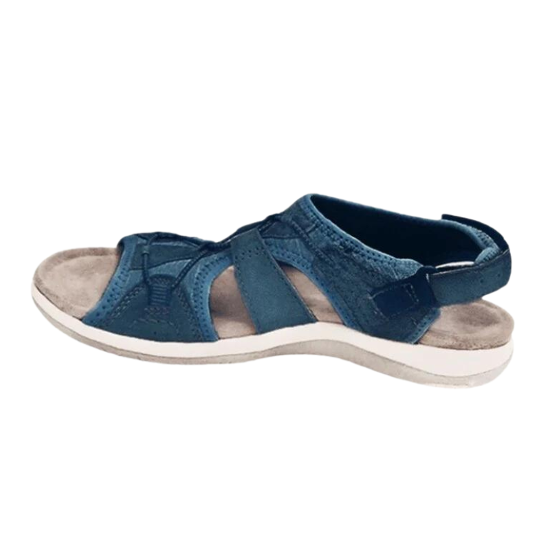 Teal blue suede fisherman sandals with cushioned footbed side view