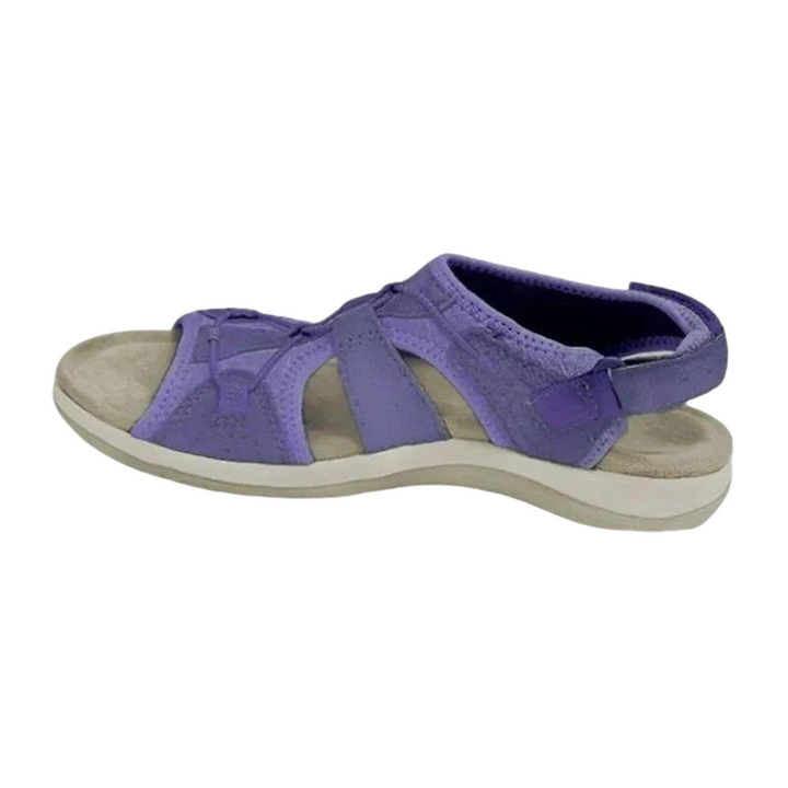 Lavender purple suede sandals with crisscross straps and white outsole