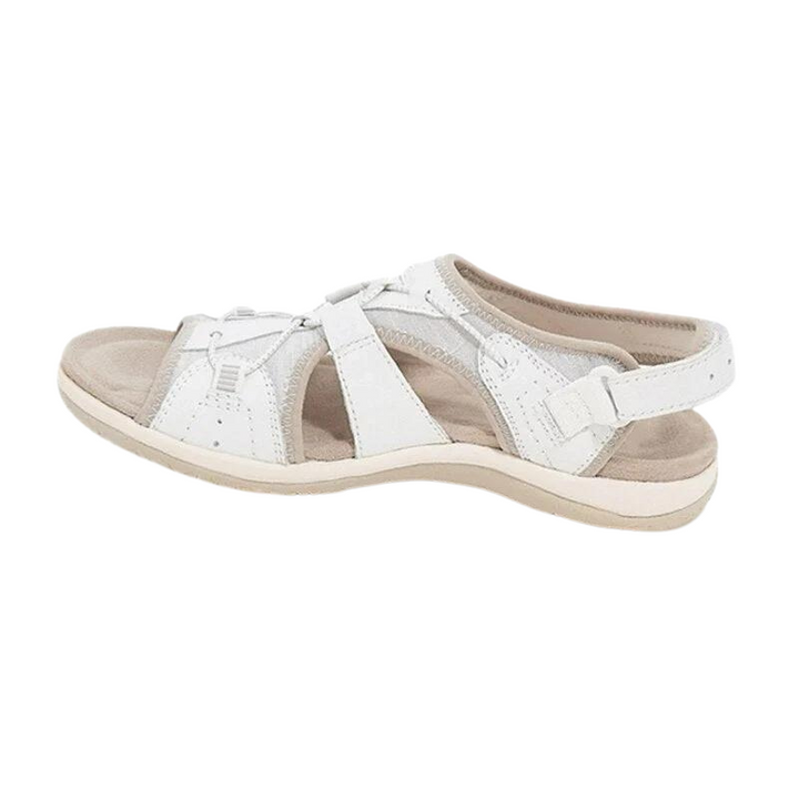 White leather fisherman sandals with crisscross straps and beige sole