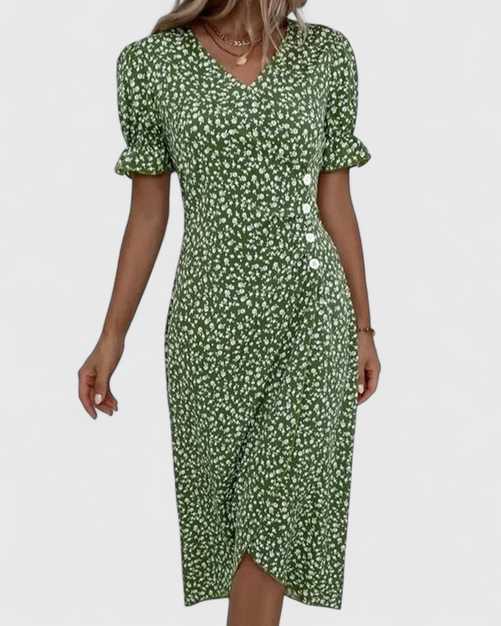 Front view of green floral midi dress with V-neck and ruffle cuffs