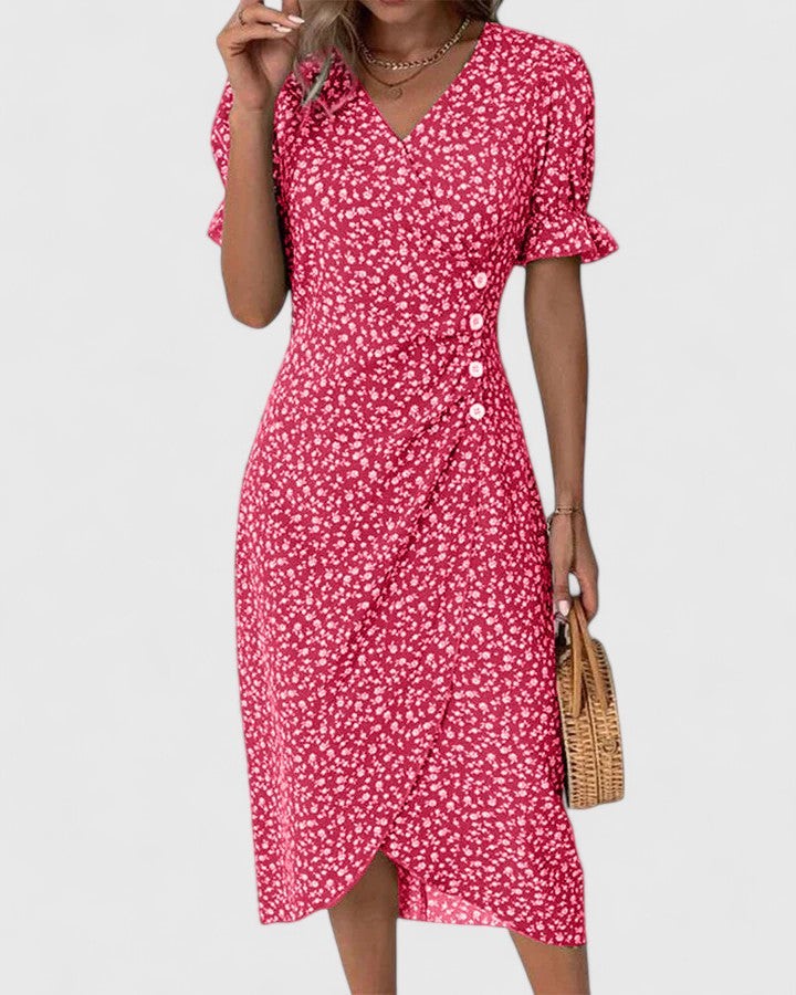 Pink floral wrap dress with button detail and flutter sleeves