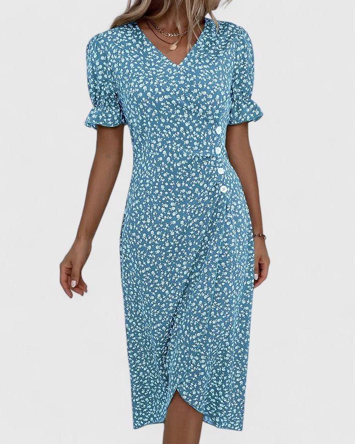 Blue ditsy floral wrap dress with V-neck and ruffled short sleeves