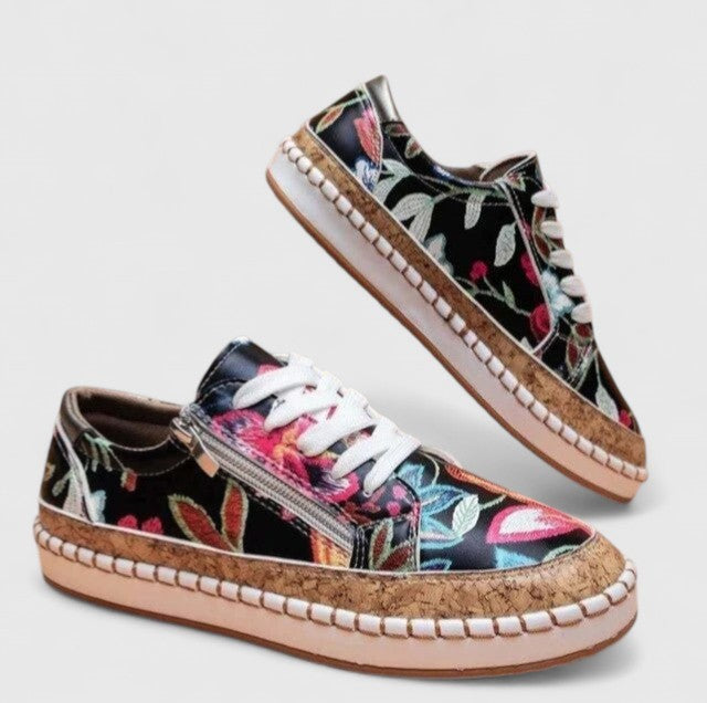 black floral embroidered sneakers with cork platform sole and lace-up front