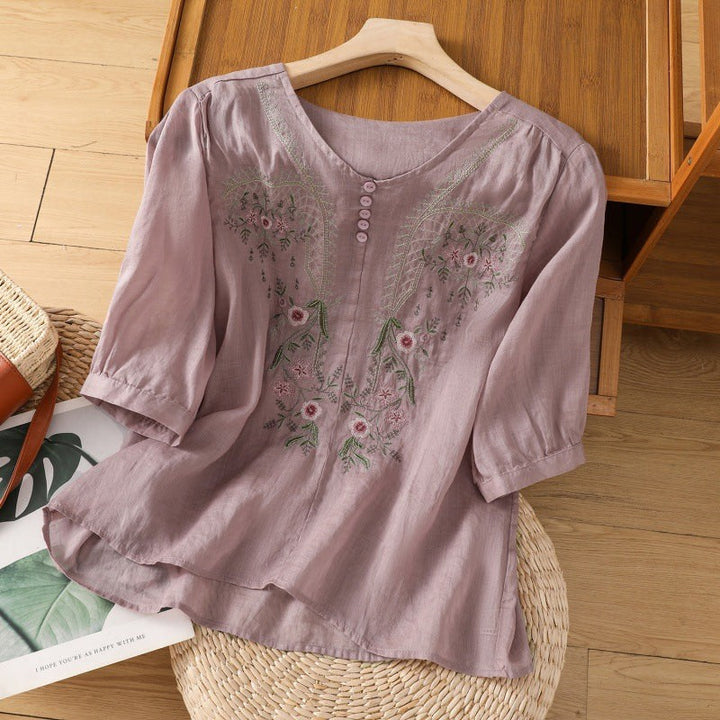 Mauve floral embroidered linen blouse with round neckline and half sleeves