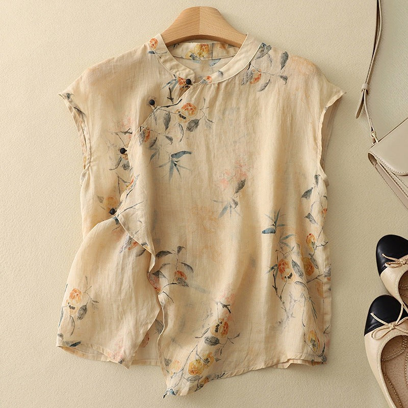 Beige floral linen blouse with mandarin collar and cap sleeves on hanger