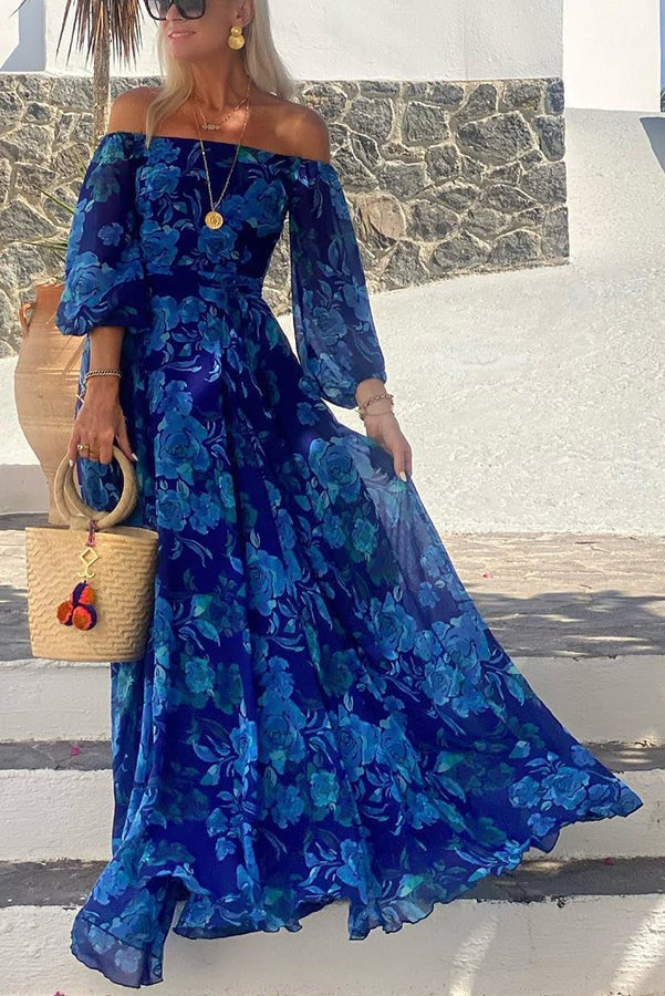 Blue floral off-shoulder maxi dress with flowing chiffon skirt and long sleeves