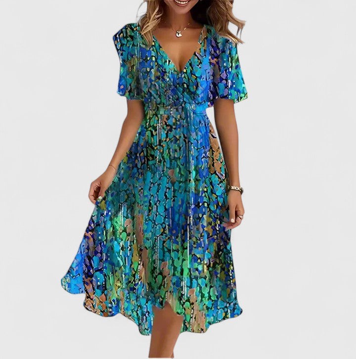 Blue and green abstract print wrap dress with flutter sleeves and V-neck
