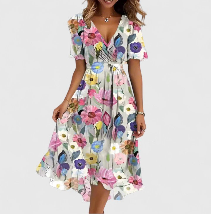 Pastel floral wrap dress with flutter sleeves and cinched waist tie