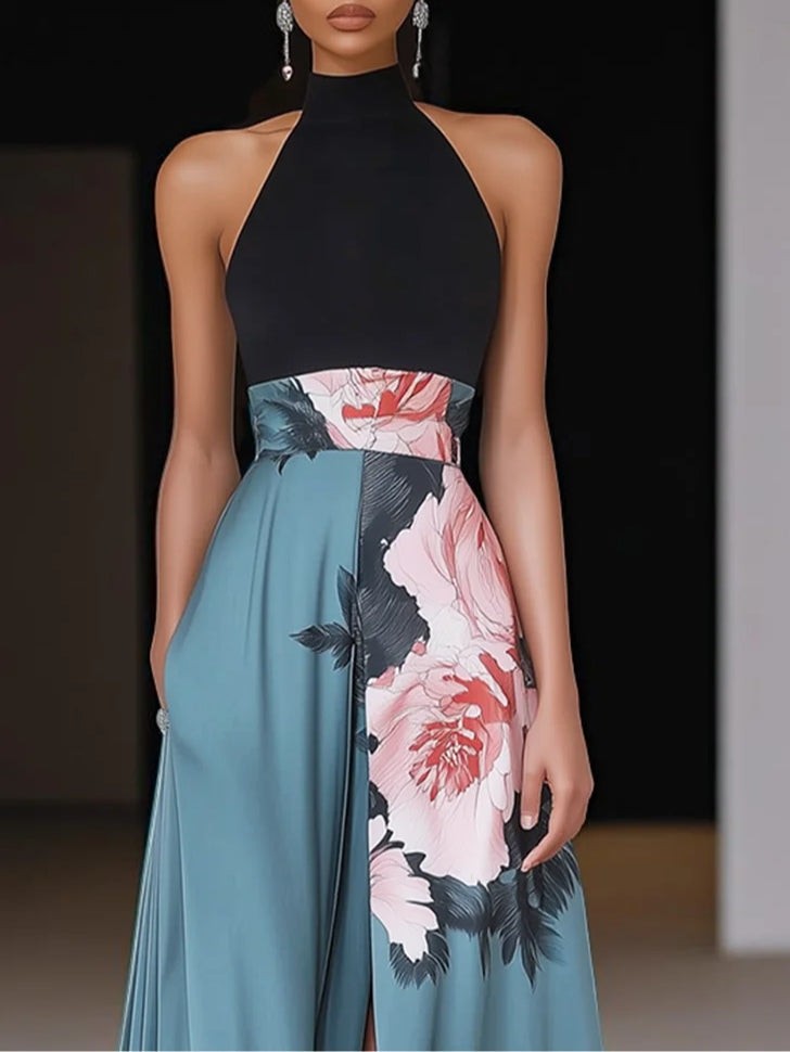 Halter neck maxi dress featuring black bodice and floral high-slit skirt