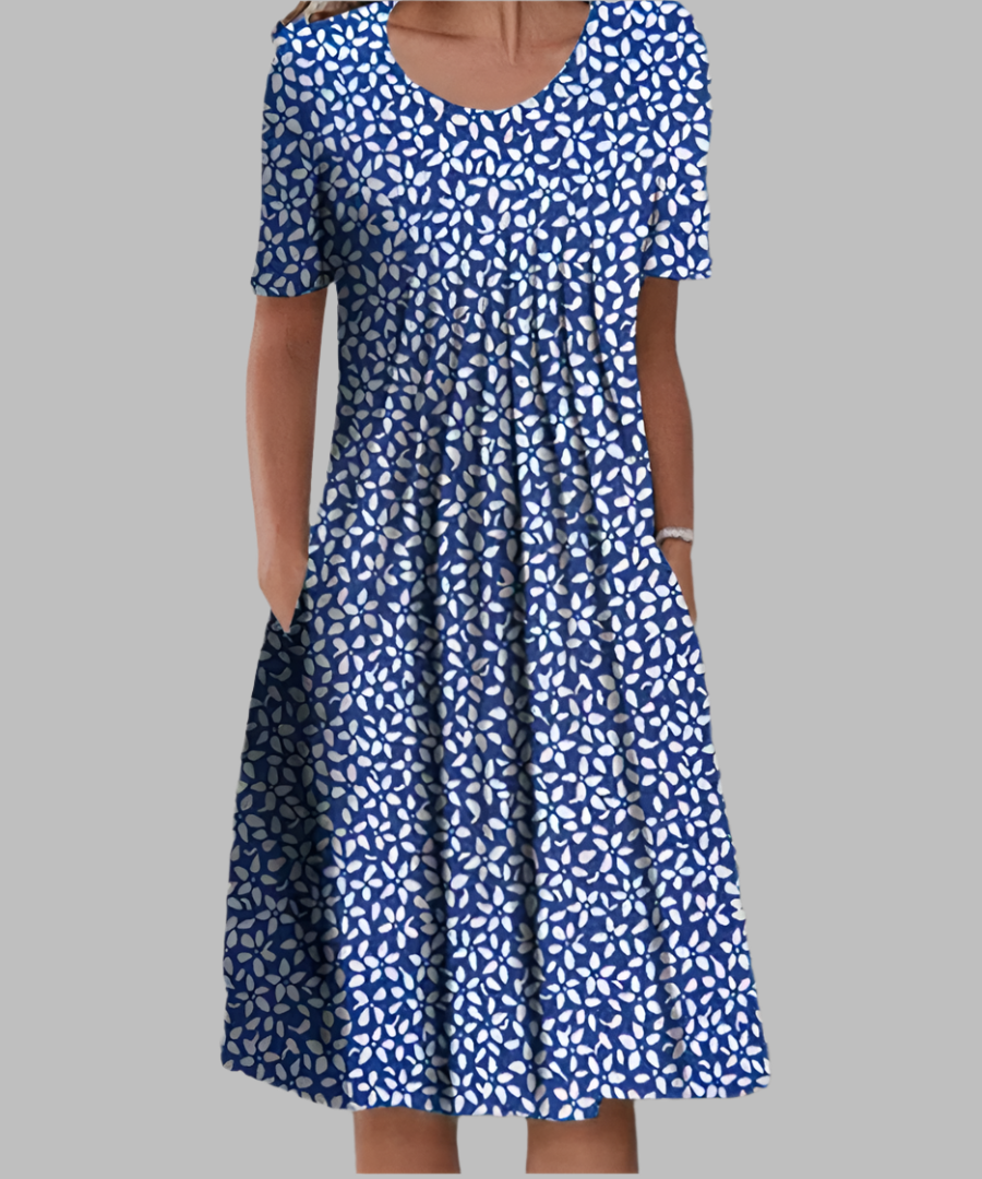 Navy floral midi dress with white petal print and pleated bodice detail