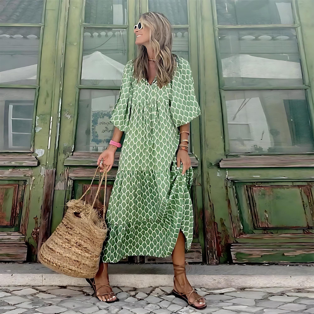 Green geometric print maxi dress with tiered skirt and flowy puff sleeves