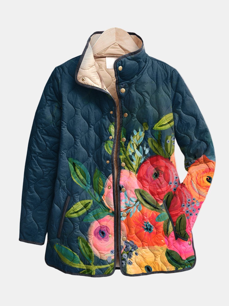 Navy quilted puffer jacket with vibrant painted floral print and stand collar