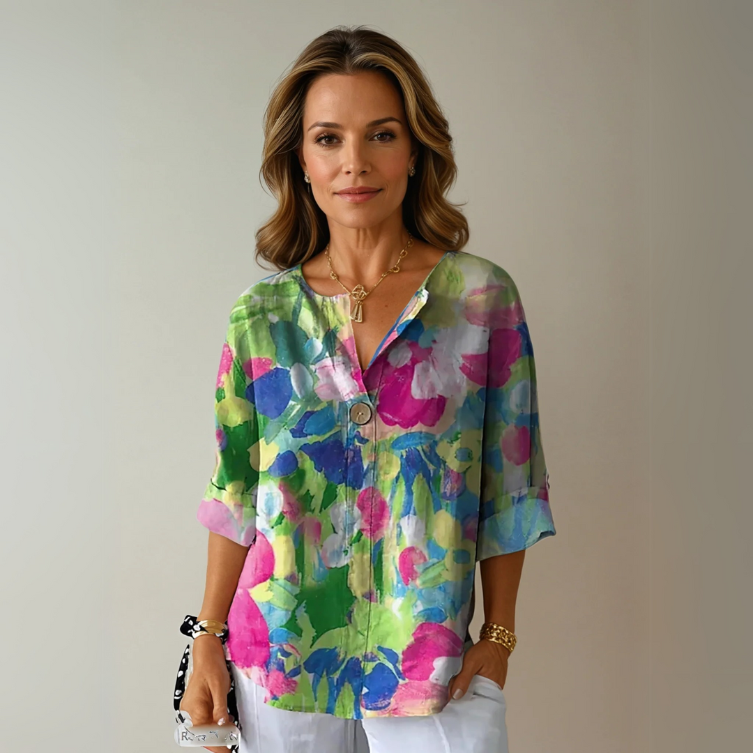 Abstract watercolor print blouse in green and pink with V-neck detail