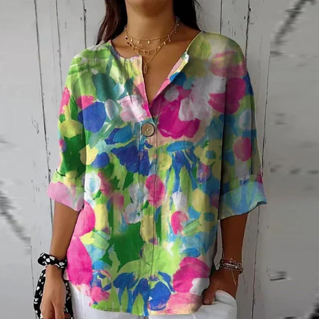 Watercolor floral blouse in green and pink with relaxed fit and V-neck