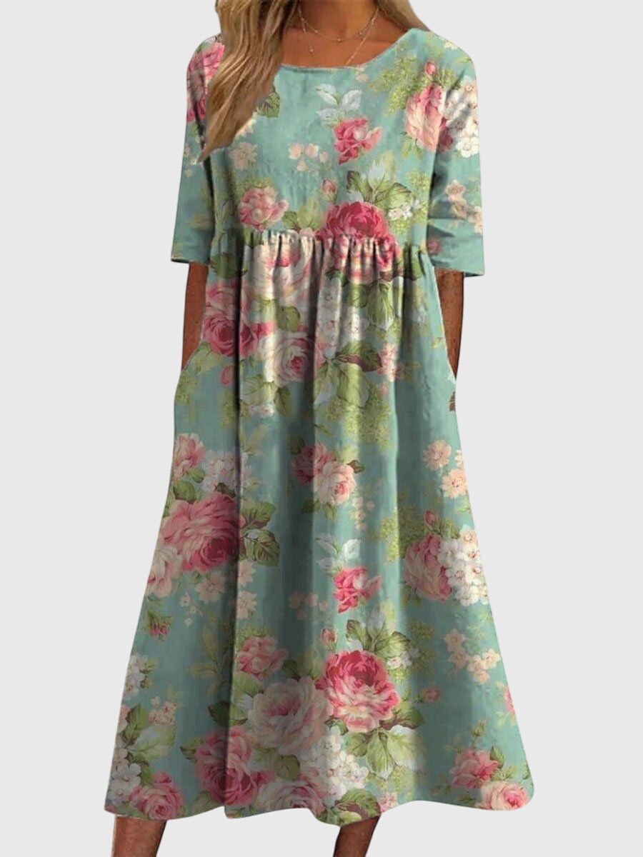 sage green midi dress with pink rose print and pockets