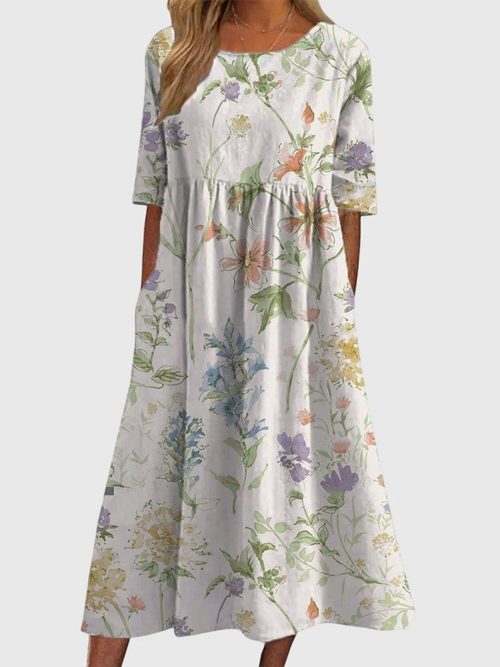 white floral midi dress with watercolor wildflower design