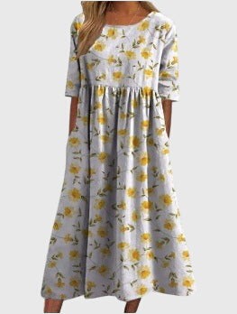 gray midi dress with yellow floral print and half sleeves