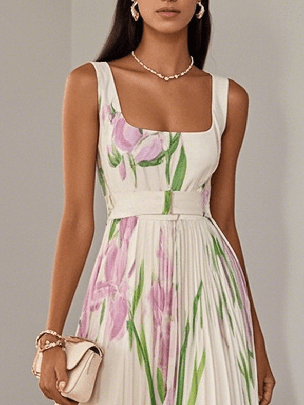 Close-up of white floral maxi dress bodice with belted waist detail