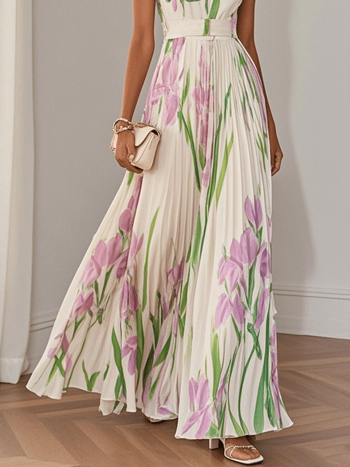 Pleated white maxi dress skirt with purple tulip print flowing to floor