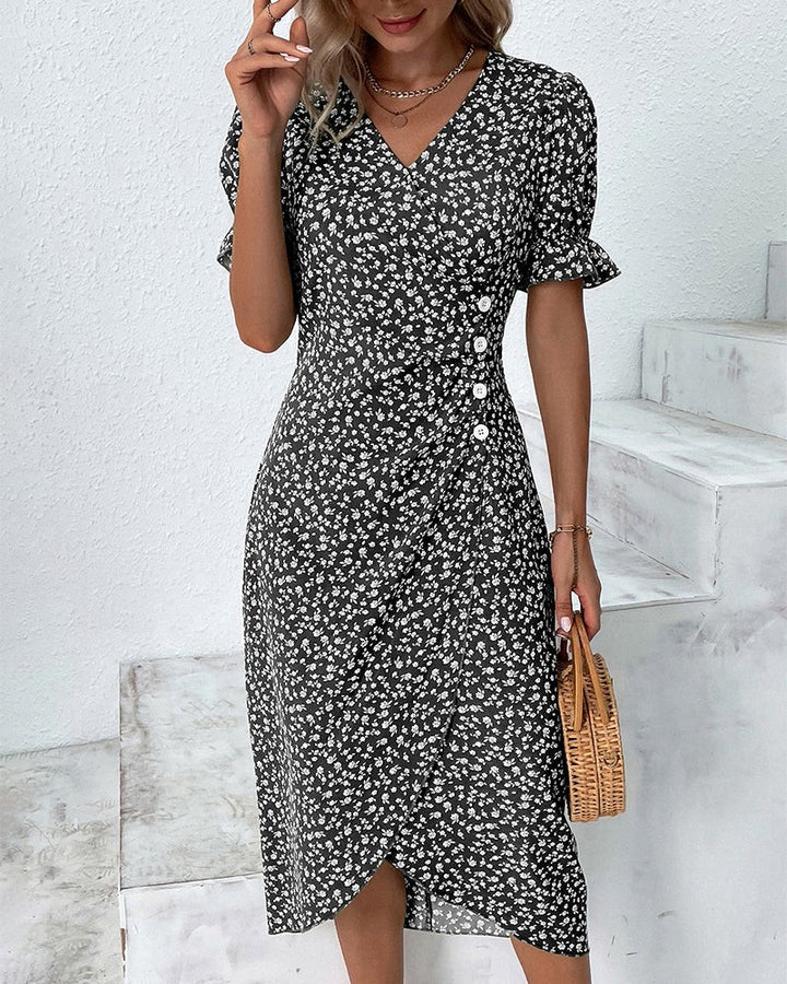 Black and white floral wrap dress with ruffled short sleeves