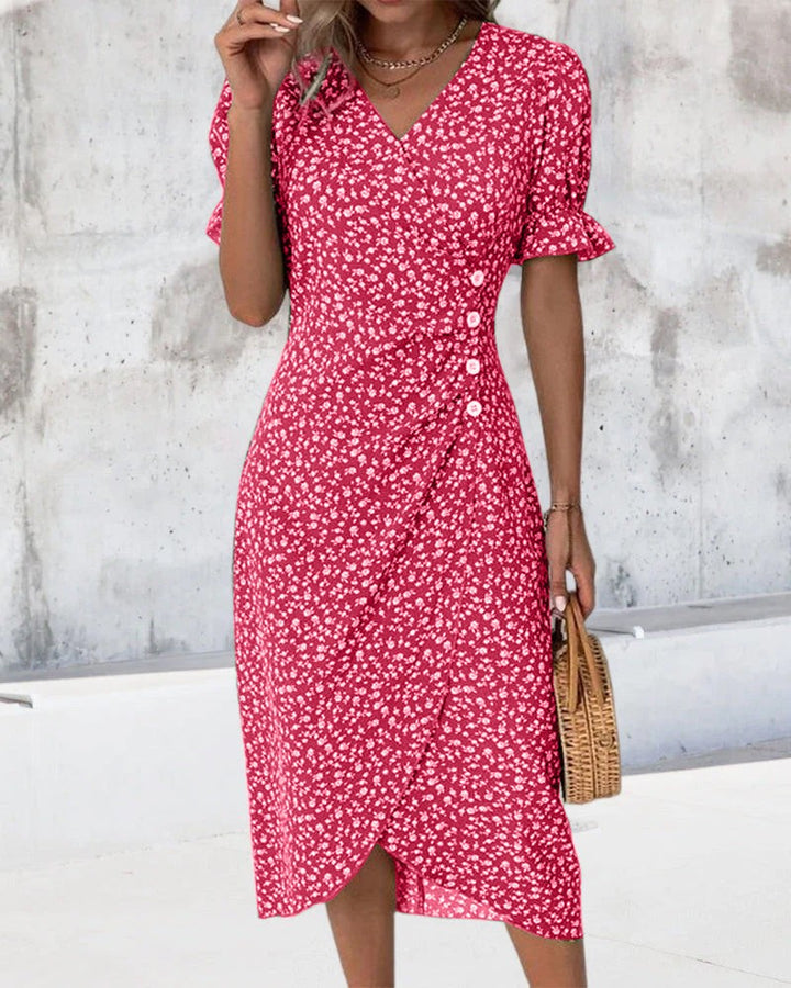 Red floral midi dress featuring button trim and flutter sleeves