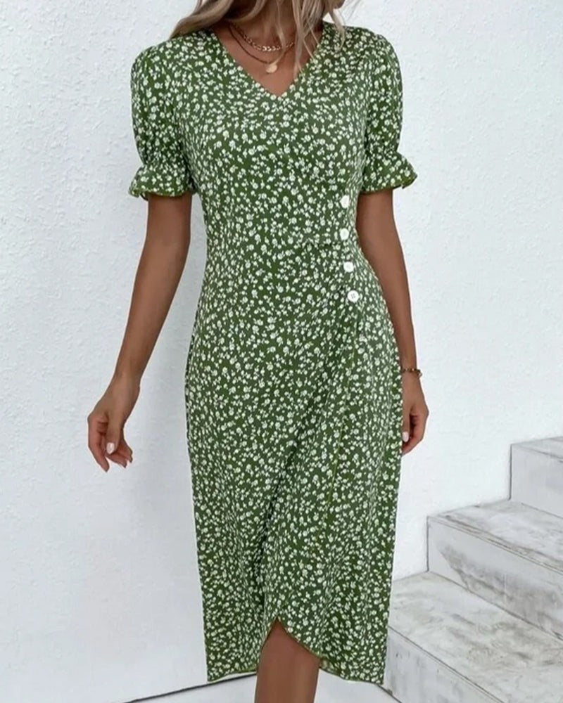 Green floral wrap dress paired with straw handbag, front view