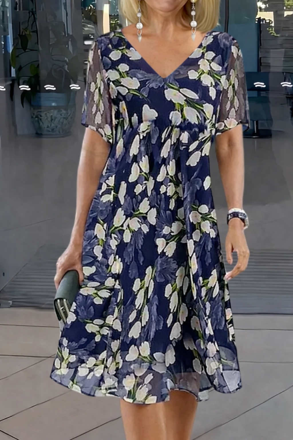 navy floral A-line dress with sheer short sleeves and V-neckline