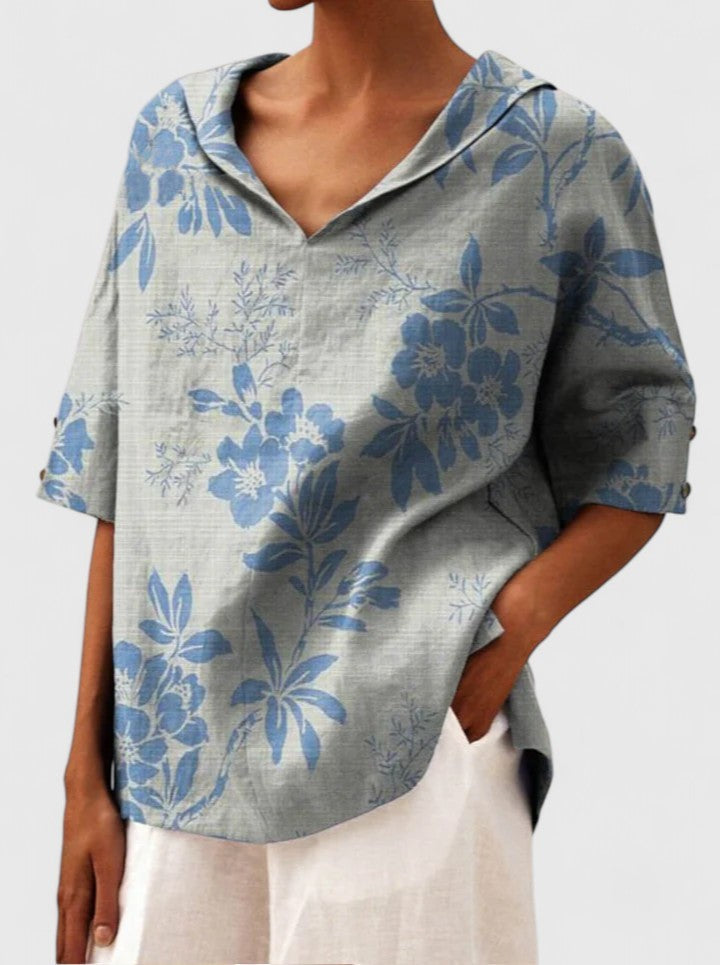 Blue floral print linen top with hooded V-neck and half sleeves