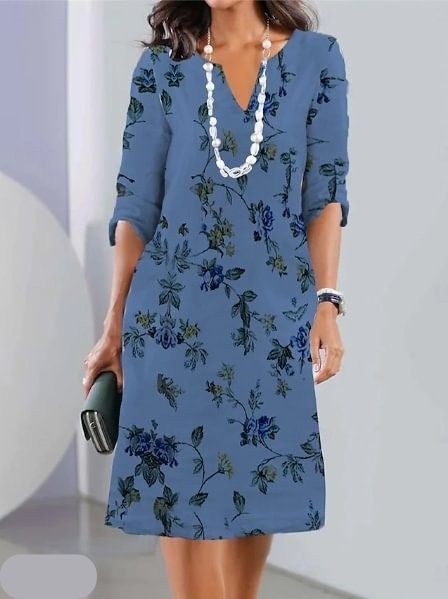 Blue floral print tunic dress with V-neck and rolled three-quarter sleeves