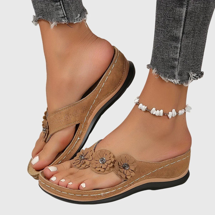 Camel brown floral wedge sandals with stitched toe-post design