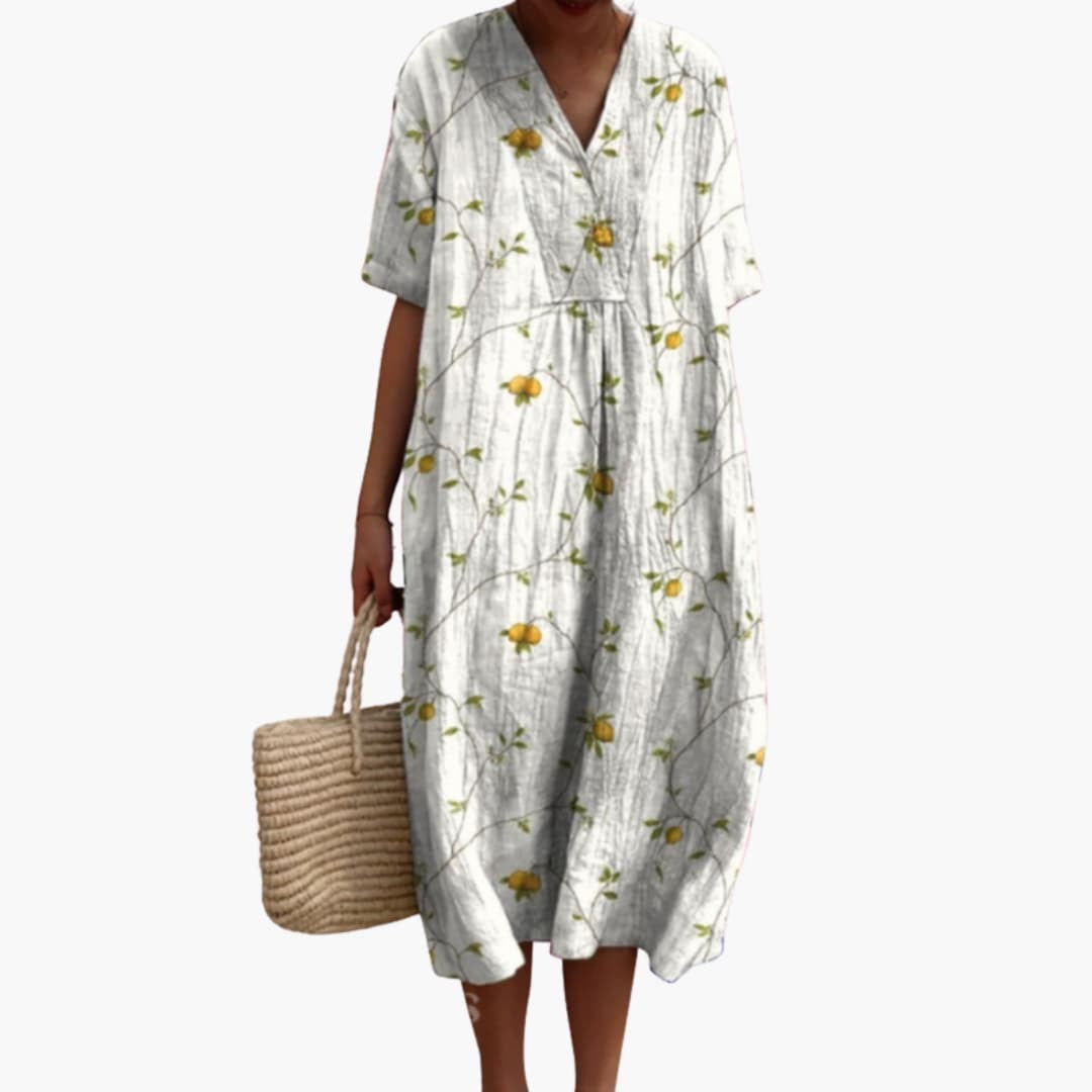 white lemon print V-neck midi dress with short sleeves and oversized cut