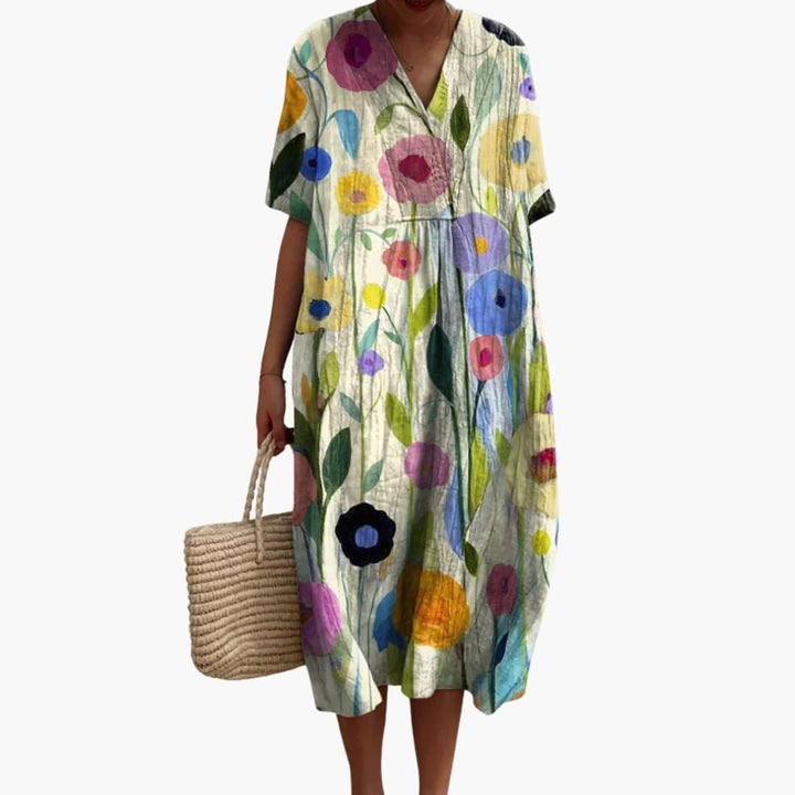 pastel floral V-neck midi dress with short sleeves and loose silhouette