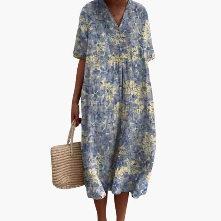 blue floral V-neck midi dress with oversized short-sleeve design