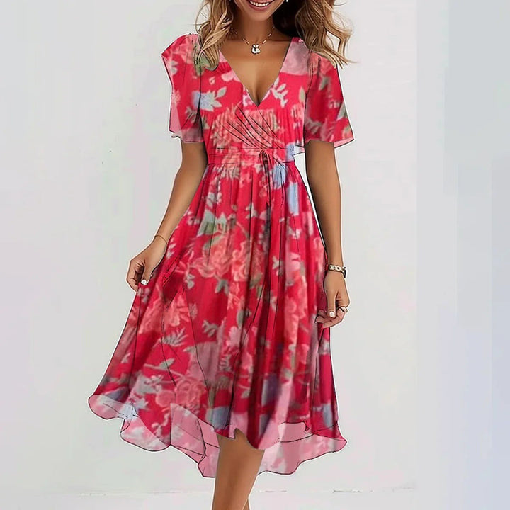 Red floral wrap dress with V-neck, flutter sleeves and tie waist detail