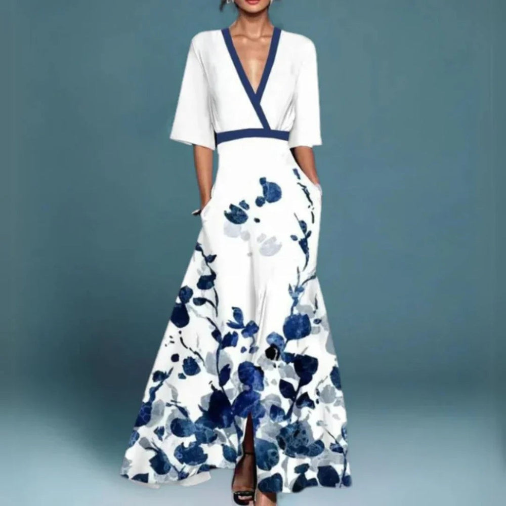 White maxi dress with navy floral print, contrast trim and V-neckline