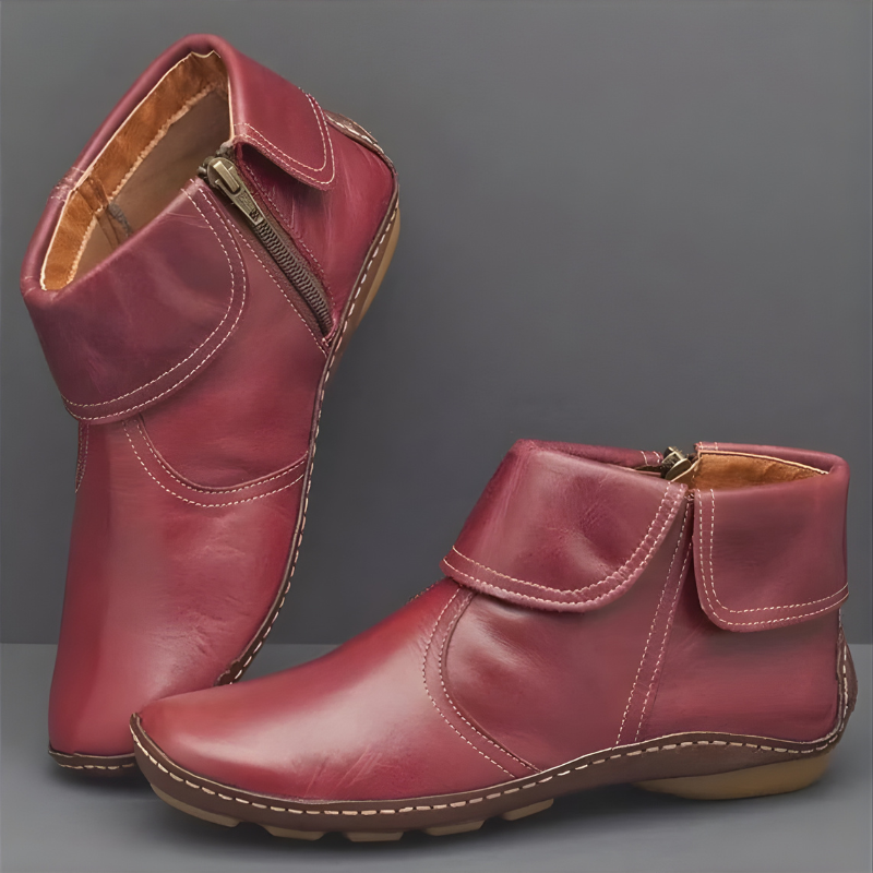 Burgundy leather ankle boots with fold-over cuff and side zip fastening